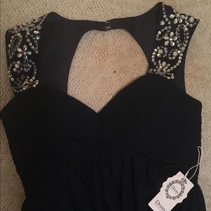 Full length dark Navy gown. New, never worn.